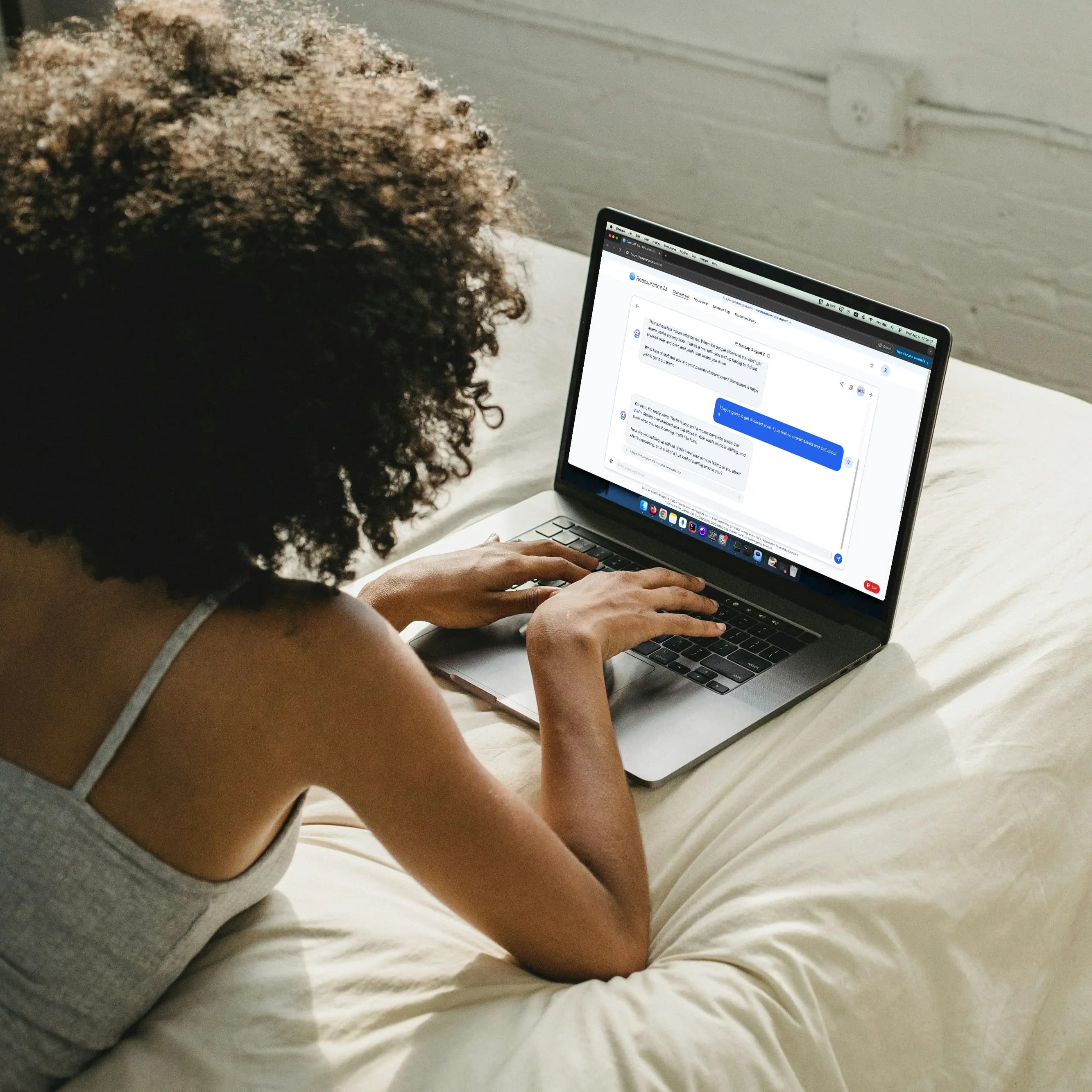 A young woman using the Chat with Sai feature of Reassurance AI.